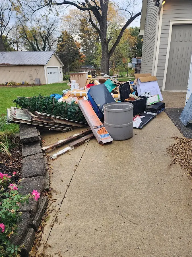 Dumpster being loaded with debris for 3 Yard Dumpster Rental in Mount Hermon